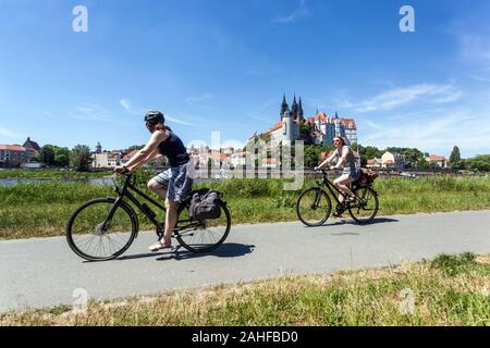 Two german women riding a bicycle, along Elbe River bike Meissen Germany Castles Saxony, Women riding bike Stock Photo