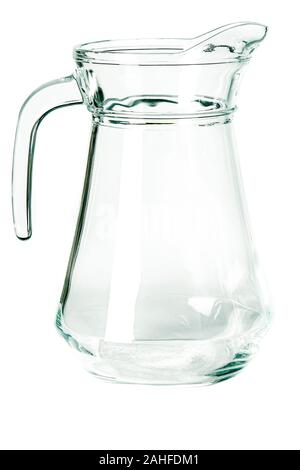 An empty glass glass and a carafe for water stand on a white background Stock Photo
