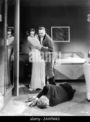 JOAN CRAWFORD as Flaemmchen WALLACE BEERY as General Director Preysing and JOHN BARRYMORE (on floor) in GRAND HOTEL 1932 director Edmund Goulding gowns Gilbert Adrian Metro Goldwyn Mayer Stock Photo