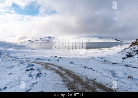 Deosai National Park Picturesque Breathtaking View Sheosar Lake with Snowy Landscape on a Sunrise Blue Sky Day Stock Photo