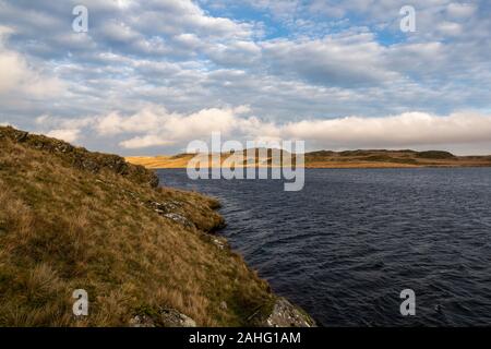 Teifi Pools, Cambrian Mountains, Ceredigion, Wales, UK. 29th December 2019  UK Weather: Cloudy with outbreaks of sunshine on the Cambrian Mountains in mid Wales, with Llyn Egnant in view, one of the nearby lakes which make up ‘Teifi Pools’. Few of the lakes have been harnessed for water supply with dams. © Ian Jones/Alamy Live News Stock Photo