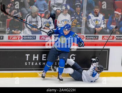 Trinec, Czech Republic. 29th Dec, 2019. L-R Tamirlan Gaitamirov (KAZ) and Aaut Raty (FIN) in action during the 2020 IIHF World Junior Ice Hockey Championships Group A match between Kazakhstan and Finland in Trinec, Czech Republic, on December 29, 2019. Credit: Vladimir Prycek/CTK Photo/Alamy Live News Stock Photo