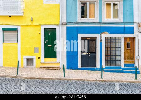 Colorful wooden doors in the facade of a typical Lisbon house, Portugal Stock Photo