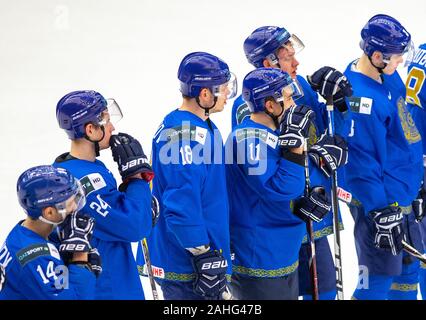 Trinec, Czech Republic. 29th Dec, 2019. Kazakh players are seen after the 2020 IIHF World Junior Ice Hockey Championships Group A match between Kazakhstan and Finland in Trinec, Czech Republic, on December 29, 2019. Credit: Vladimir Prycek/CTK Photo/Alamy Live News Stock Photo