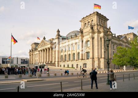 Tourists from all over the world in front of the historic Reichstag in the centre of Berlin Stock Photo