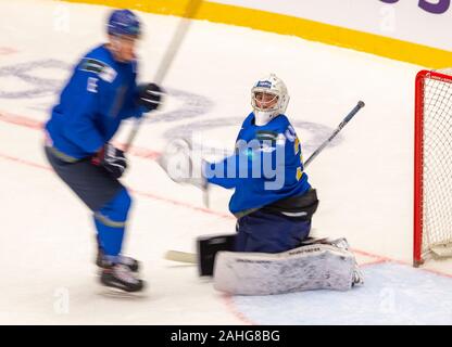 Trinec, Czech Republic. 29th Dec, 2019. L-R Tamirlan Gaitamirov and Roman Kalmykov (both KAZ) in action during the 2020 IIHF World Junior Ice Hockey Championships Group A match between Kazakhstan and Finland in Trinec, Czech Republic, on December 29, 2019. Credit: Vladimir Prycek/CTK Photo/Alamy Live News Stock Photo