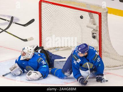 Trinec, Czech Republic. 29th Dec, 2019. L-R Roman Kalmykov and Timofei Katasonov (both KAZ) in action during the 2020 IIHF World Junior Ice Hockey Championships Group A match between Kazakhstan and Finland in Trinec, Czech Republic, on December 29, 2019. Credit: Vladimir Prycek/CTK Photo/Alamy Live News Stock Photo