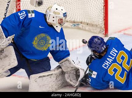 Trinec, Czech Republic. 29th Dec, 2019. L-R Roman Kalmykov and Maxim Chalov (both KAZ) in action during the 2020 IIHF World Junior Ice Hockey Championships Group A match between Kazakhstan and Finland in Trinec, Czech Republic, on December 29, 2019. Credit: Vladimir Prycek/CTK Photo/Alamy Live News Stock Photo