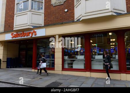 Guildford, United Kingdom - November 06 2019:  The frontage of Sainsburys Supermarket on High Street Stock Photo