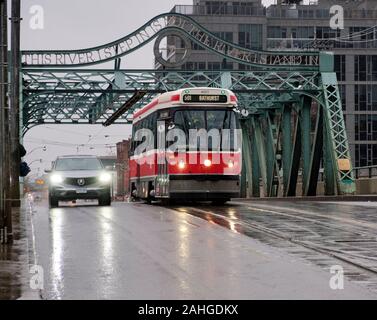 Toronto, Ontario, Canada. December 29th, 2019.  After four decades of service to Toronto commuters, the Toronto Transit Commission’s Canadian Light Rail Vehicle (CLRV) streetcars make their last runs over the Don river.  Today marks the final day of service of the venerable icon, which was first introduced in 1979. To mark the occasion, the last streetcars are running as free service along Queen Street to commemorate the final day of service.  Credit: JF Pelletier/ Alamy Live News. Stock Photo