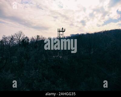 Man standing on platform above Samobor used as view point for observing town and surroundings, photographed with drone Stock Photo