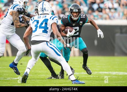 Jacksonville, FL, USA. 29th Dec, 2019. Jacksonville Jaguars wide receiver Dede Westbrook (12) runs with the ball during 1st half NFL football game between the Indianapolis Colts and the Jacksonville Jaguars at TIAA Bank Field in Jacksonville, Fl. Romeo T Guzman/CSM/Alamy Live News Stock Photo