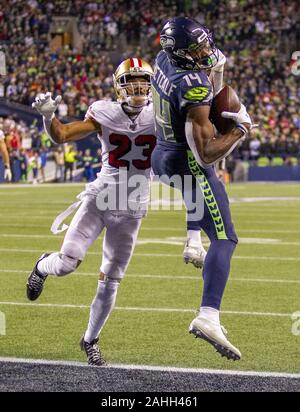 Seattle Seahawks' D.K. Metcalf catches a touchdown pass during the second  half of an NFL wild-card playoff football game against the Philadelphia  Eagles, Sunday, Jan. 5, 2020, in Philadelphia. (AP Photo/Julio Cortez