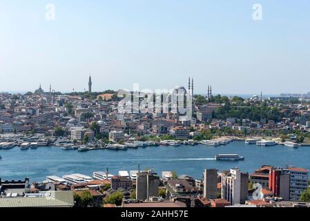 Beyoglu district old houses with Galata tower on top, view from the Golden Horn Stock Photo