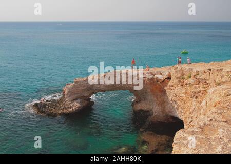 Natural stone arch 'Love Bridge'. Agia Napa, Cyprus Stock Photo