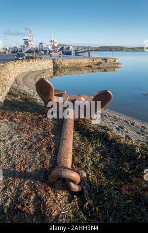 old rusted anchor by the harbour, Strangford, Northern Ireland, UK Stock Photo