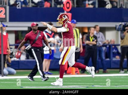 Arlington, Texas, USA. 29th Dec, 2019. Washington Redskins quarterback Case Keenum (8) celebrates after passing for a touchdown during an NFL football game between the Washington Redskins and Dallas Cowboys at AT&T Stadium in Arlington, Texas. Manny Flores/CSM/Alamy Live News Stock Photo