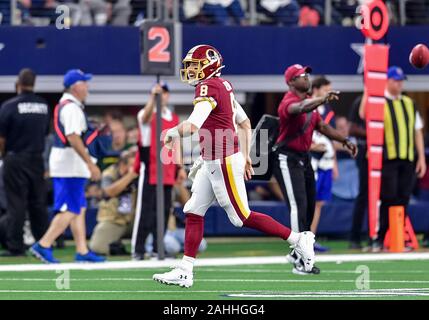 Arlington, Texas, USA. 29th Dec, 2019. Washington Redskins quarterback Case Keenum (8) celebrates after passing for a touchdown during an NFL football game between the Washington Redskins and Dallas Cowboys at AT&T Stadium in Arlington, Texas. Manny Flores/CSM/Alamy Live News Stock Photo