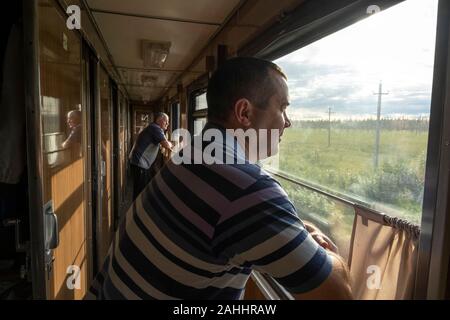 Passenger on the Kotlas to Labitnangi Trans-Polar Railway overnight train in Russia Stock Photo
