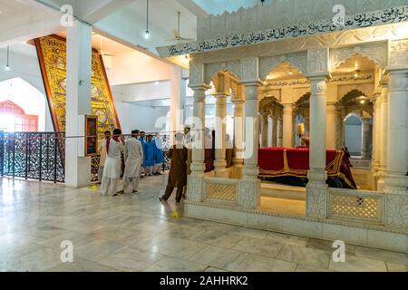 Larkana Bhutto Family Mausoleum Picturesque Interior View of a Martyr Shaheed Tomb with Visitors Stock Photo