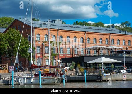 Old town hall and buildings on the banks of the River Aura in Turku Finland. Stock Photo