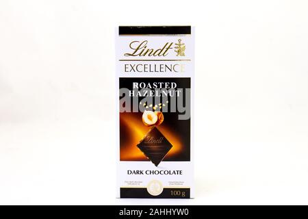 Alberton, South Africa - a slab of Lindt roasted hazelnut flavoured dark chocolate isolated on a white background image in horizontal format Stock Photo
