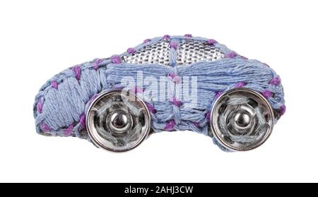 handcrafted car brooch embroidered by blue silk embroidery threads with clasp buttons isolated on white background Stock Photo