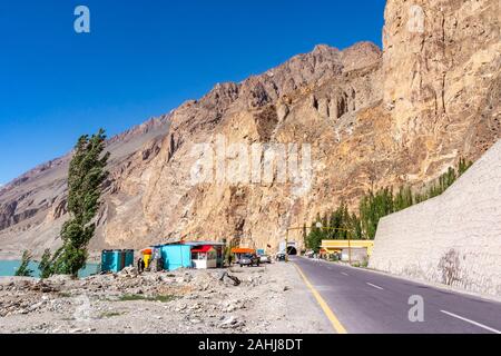 Attabad Lake Landscape Picturesque View of a Restaurant on the Karakoram Highway on a Sunny Blue Sky Day Stock Photo