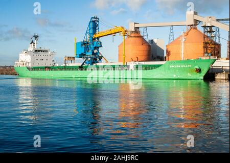 General cargo ship Arklow Willow loading at the dock in Blyth Harbour on the Northumberland Coast Stock Photo