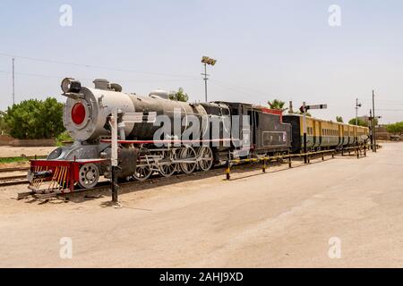 Sukkur Main Railway Station Picturesque View of an Old Retro Steam Locomotive on a Sunny Blue Sky Day Stock Photo