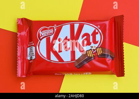 NY, USA - DECEMBER 4, 2019: Kit Kat chocolate bars in red wrapping lies ...