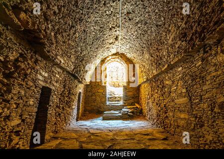 Mardan Takht-i-Bahi Throne of the Water Spring View of Underground Monk Cells on a Sunny Blue Sky Day Stock Photo