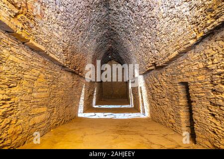 Mardan Takht-i-Bahi Throne of the Water Spring View of Underground Monk Cells on a Sunny Blue Sky Day Stock Photo