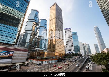 HongKong, China, November, 2019: Car, bus and taxi traffic on inner city highway in HongKong business district, Central Stock Photo