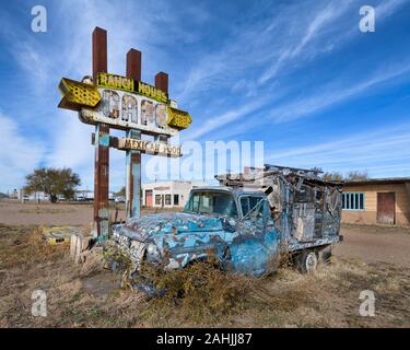 Abandoned Ranch House Cafe sign next to abandoned pick up truck along Route 66 in Tucumcari, New Mexico Stock Photo