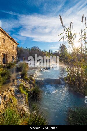 Saturnia (Tuscany, Italy) - The thermal sulphurous water of Saturnia, province of Grosseto, Tuscany region, during the winter Stock Photo