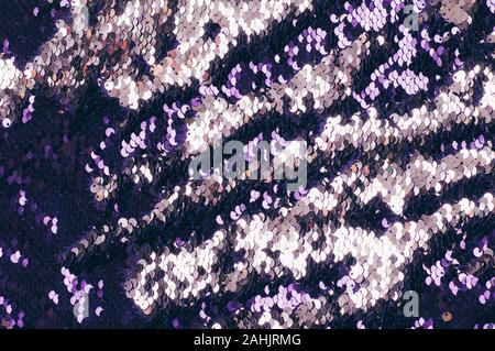 Macro photo multi colored texture of sequins. Festive glittering background. Stock Photo