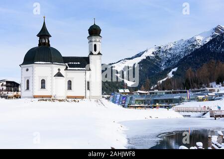 Seefeld in Tirol: church Seekirche, creek Raabach in Olympiaregion Seefeld, Tirol, Tyrol, Austria Stock Photo