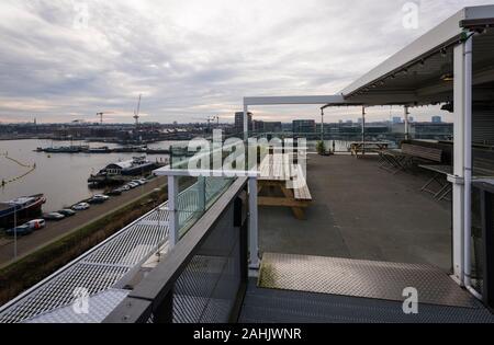Terrasse of REM Eiland, a restaurant located on top of a former offshore platform at Houthavens, a newly built up-and-coming area of Amsterdam. Stock Photo