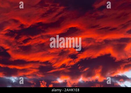 Dramatic red clouds - beautiful colorful sunset Stock Photo