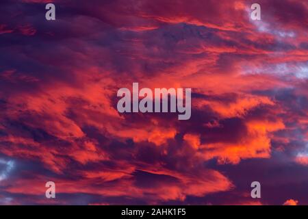 Dramatic red clouds - beautiful colorful sunset Stock Photo