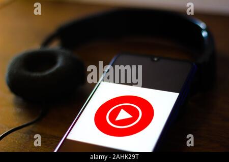 In this photo illustration the YouTube Music logo is seen displayed on a smartphone. Stock Photo