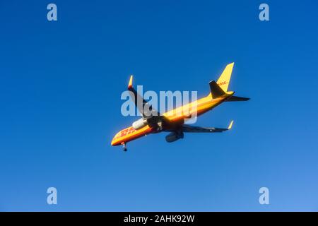 DHL Cargo Aircraft on approach to East Midlands Airport preparing to Land, UK. Stock Photo