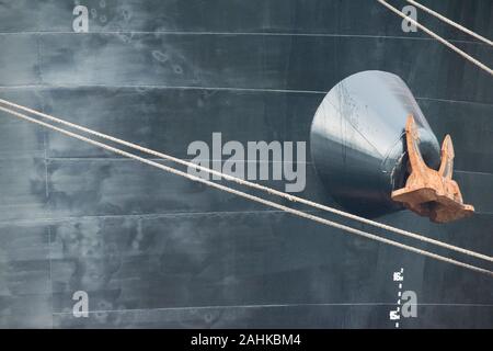 Close-up of ships's bow with anchor and mooring lines Stock Photo