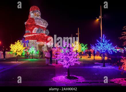 Agueda, Portugal - December 28, 2019: Night view of the world's largest Santa Claus in the city of Águeda, Portugal. Stock Photo