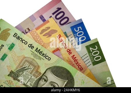 A group of 100 200 500 and 1000 mexican peso bills isolated on white background Stock Photo