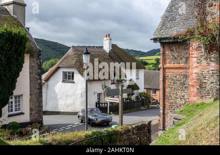 Dunsford, UK - 28 September: Antique e-type Jaguar sports car in the center of the pretty Devon village of Dunsford Stock Photo