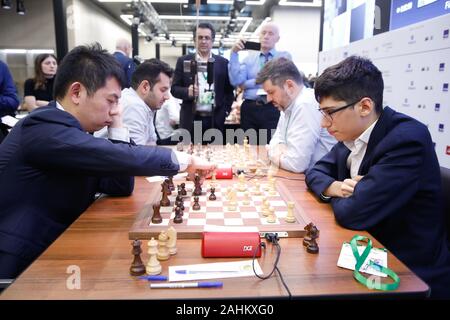 Moscow, Russia. 30th Dec, 2019. Wang Hao (L) of China and Alireza Firouzja  participating under the FIDE flag compete during the Blitz Open final at  2019 King Salman World Rapid & Blitz