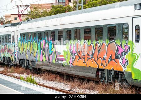 Tarragona Spain Hispanic Catalonia Renfe train railway station,maintenance track,out of service passenger train,graffiti,ES190827014 Stock Photo