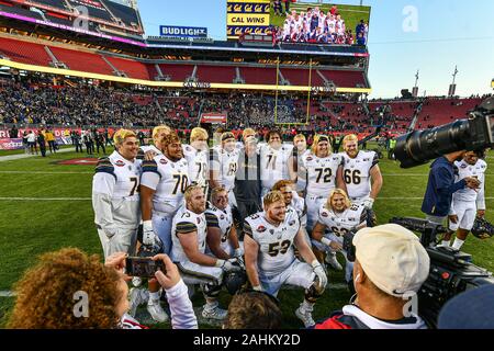 Santa Clara, California, USA. 30th Dec, 2019. The California Golden Bears offensive line poses for a picture after the Redbox Bowl game between the University of California Golden Bears and the University of Illinois Fighting Illini at Levi's Stadium in Santa Clara, California. Chris Brown/CSM/Alamy Live News Stock Photo